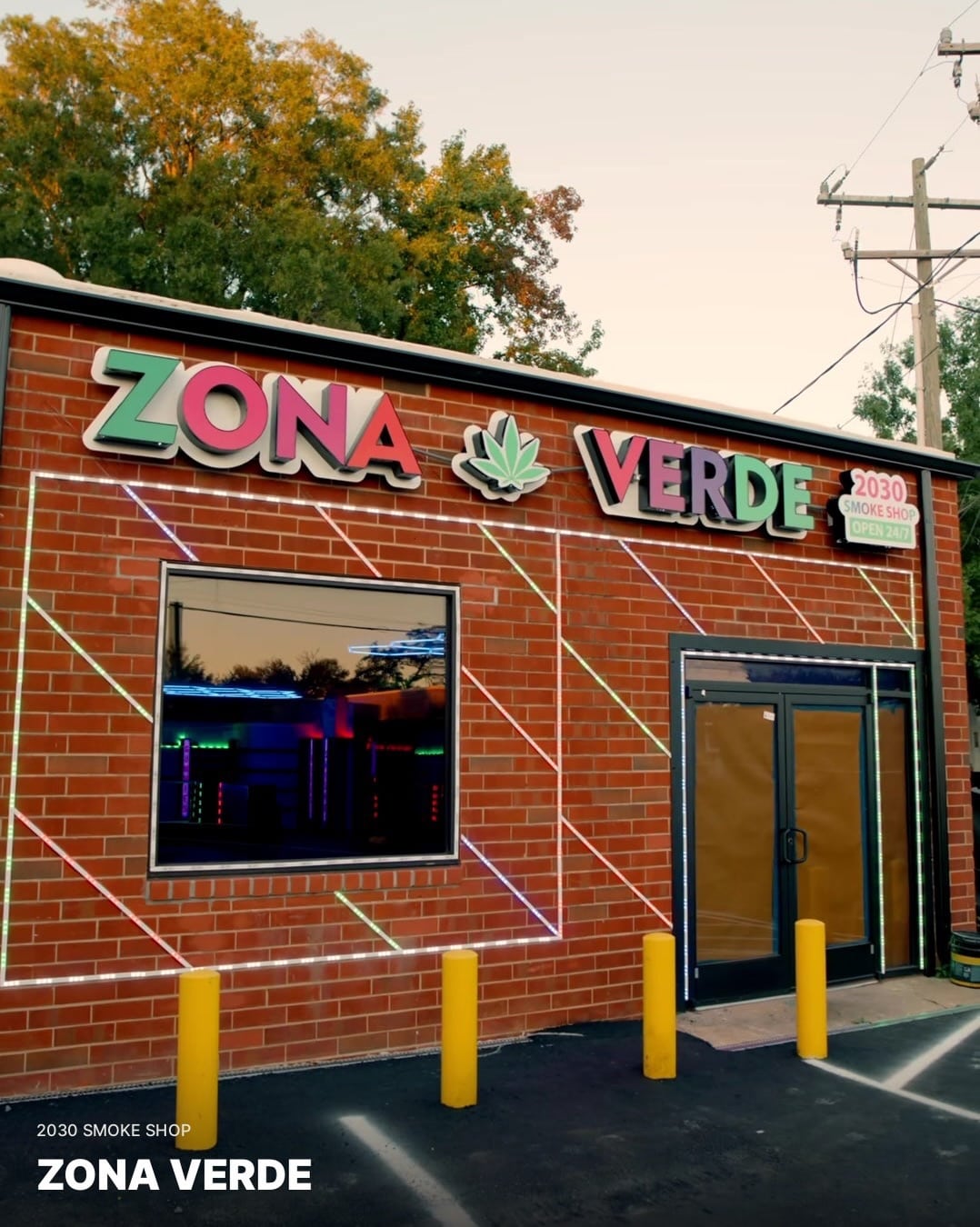 Zona Verde sign, brick storefront, and entrance on Fairwood Avenue in Charlotte.